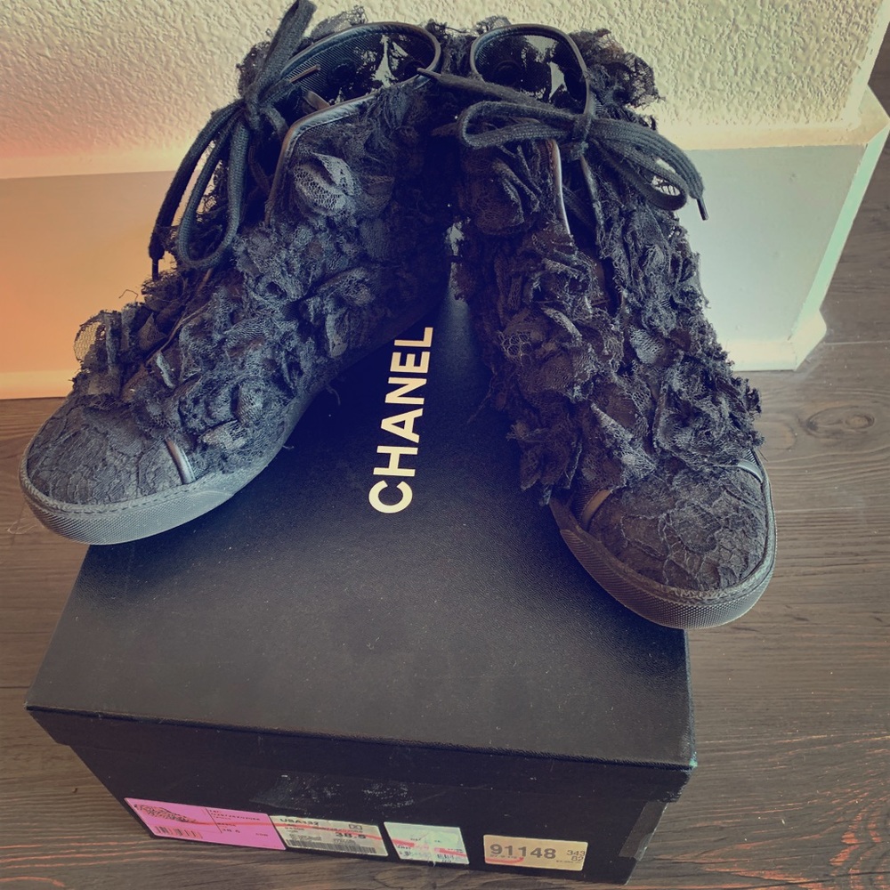 Chanel High Top Lace sneaker with flower appliqué